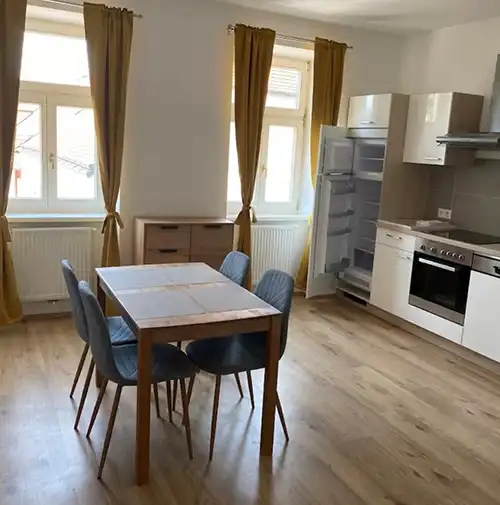 Mittendrin Appartments Wohnzimmer mit Küche